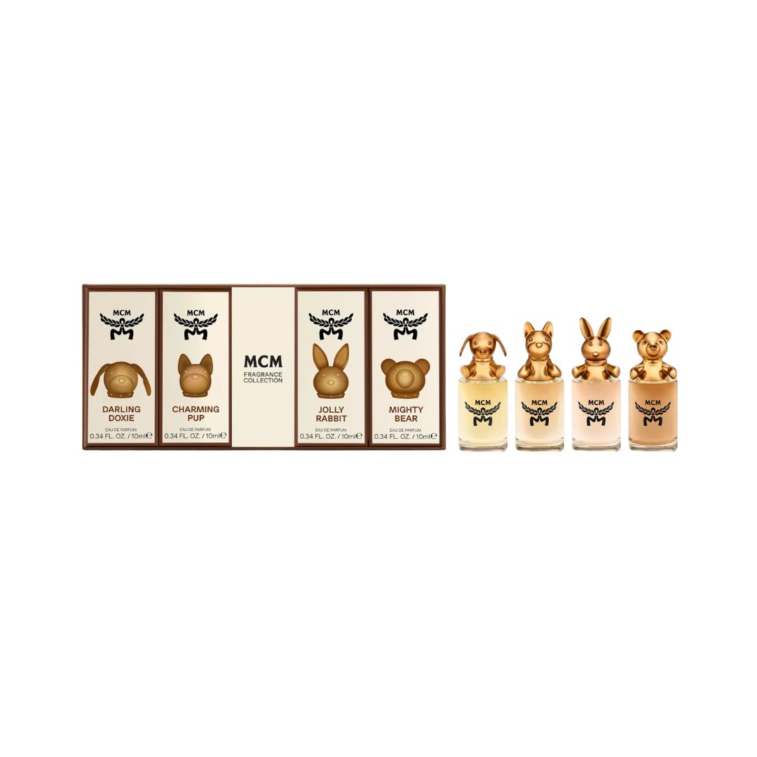 MCM Perfection Collection 4-piece fragrance sample set featuring a boxed set with four individual bottles. The bottles are shaped like animal heads (dog, hare, rabbit, bear) and have gold caps, showing different shades of beige and brown perfume liquids.