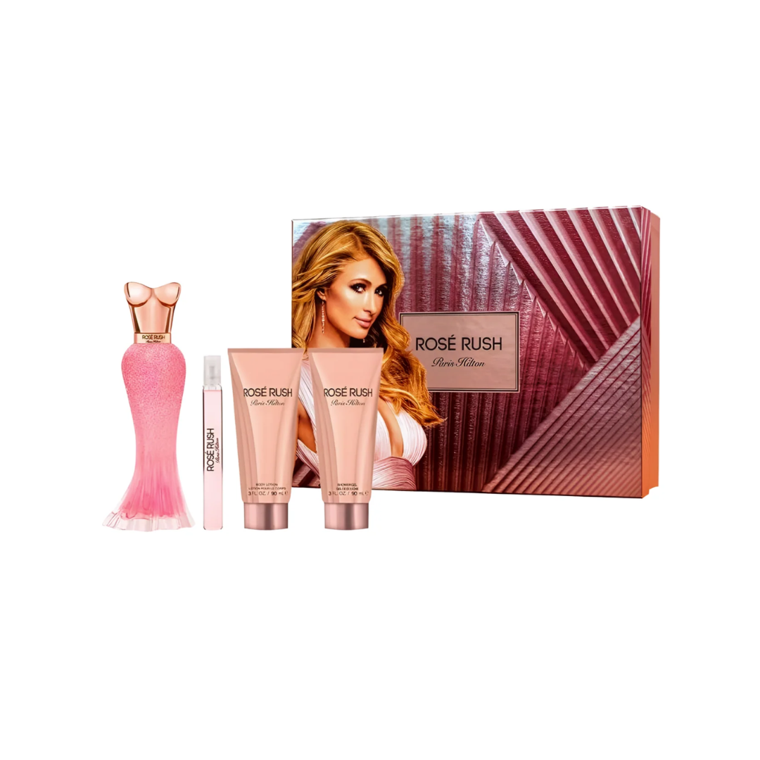 Rose Rush by Maria Elena gift set featuring a pink perfume bottle, a small travel spray, two pink body care tubes, and a branded gift box with a photo of Maria Elena on a white background.
