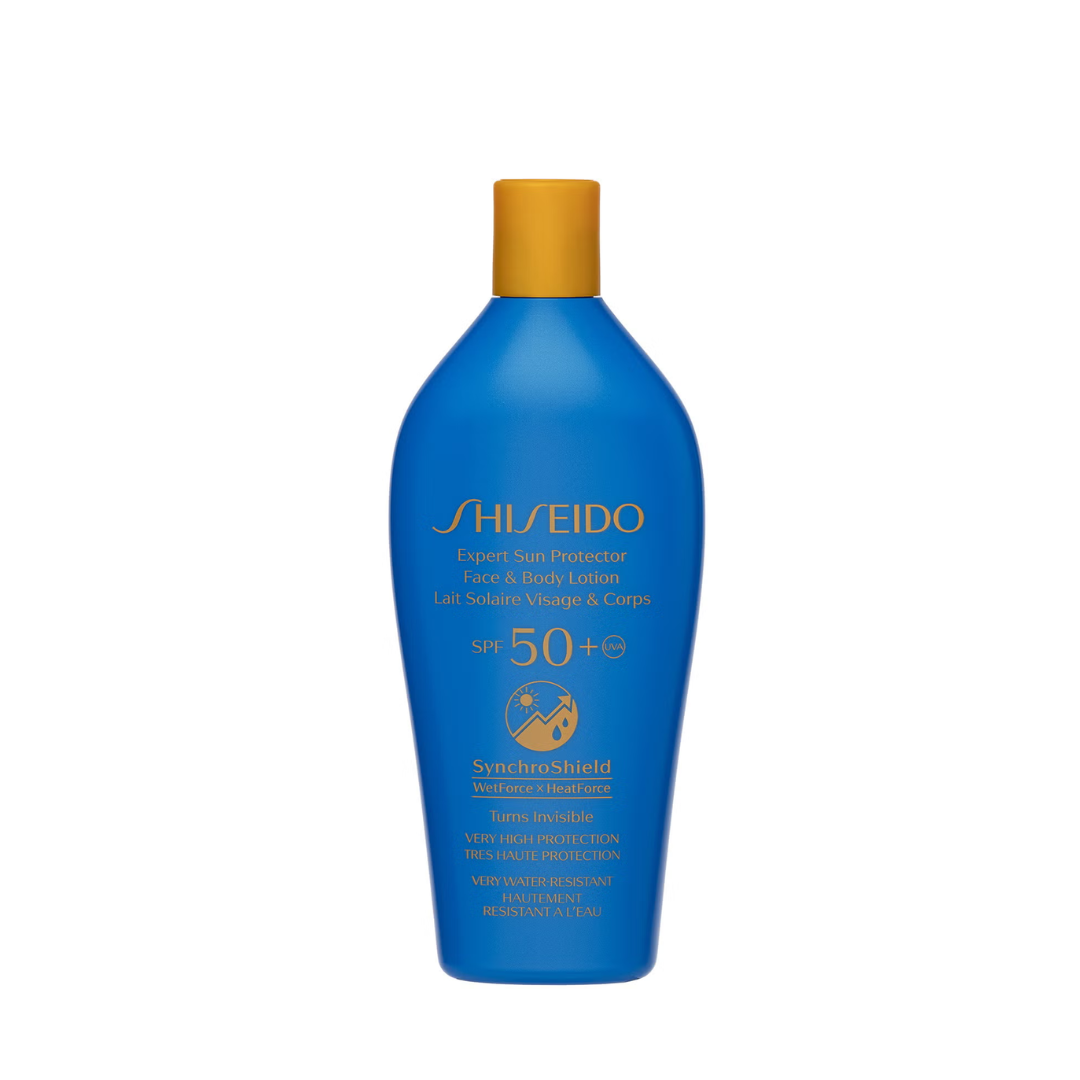 Shiseido Expert Sun Protection Face & Body Lait Solaire Vintage & Corps SPF 50+ sunscreen bottle in blue with a gold cap, on a white background.