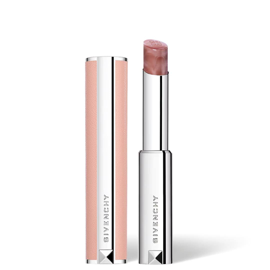 Givenchy lipstick shown open next to its cap on a clean white background. The lipstick bullet is a dusty mauve-pink shade, and the packaging features a textured pale pink body with a polished silver top and base.
