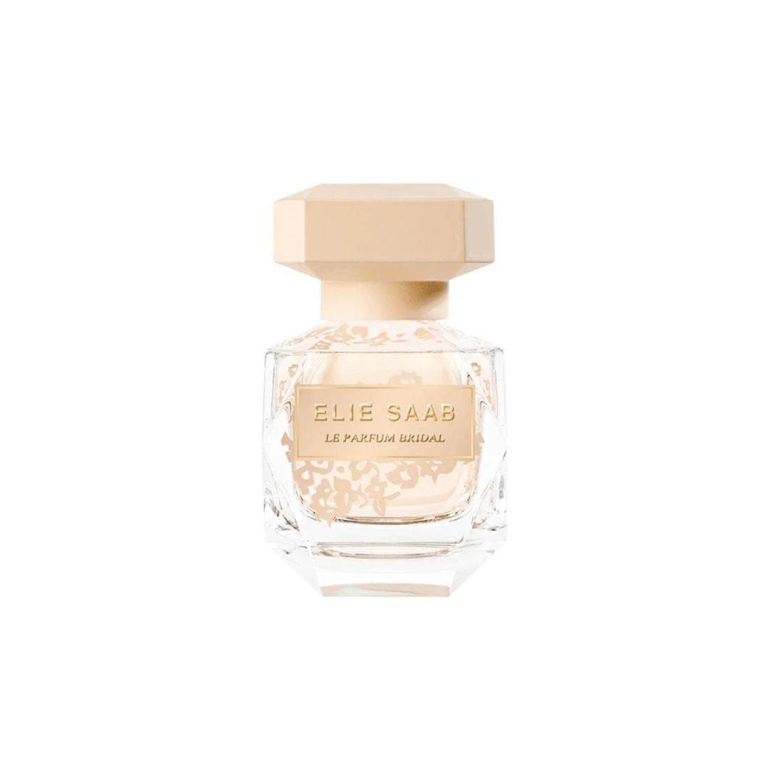 Elie Saab Le Parfum Original perfume bottle with a faceted clear glass body, pale gold label, and matching hexagonal cap on a white background.